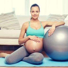 pregnant woman with exercise ball